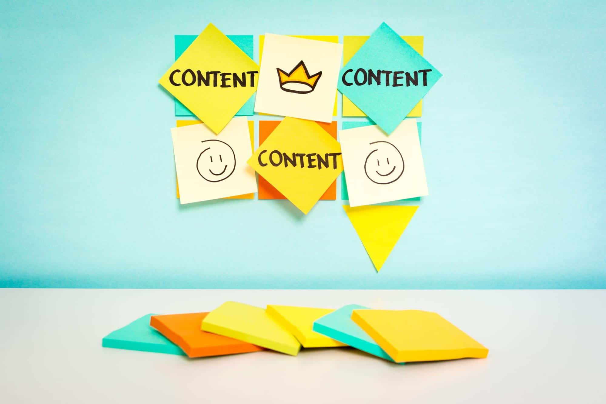 A group of sticky notes with the words content and content marketing.