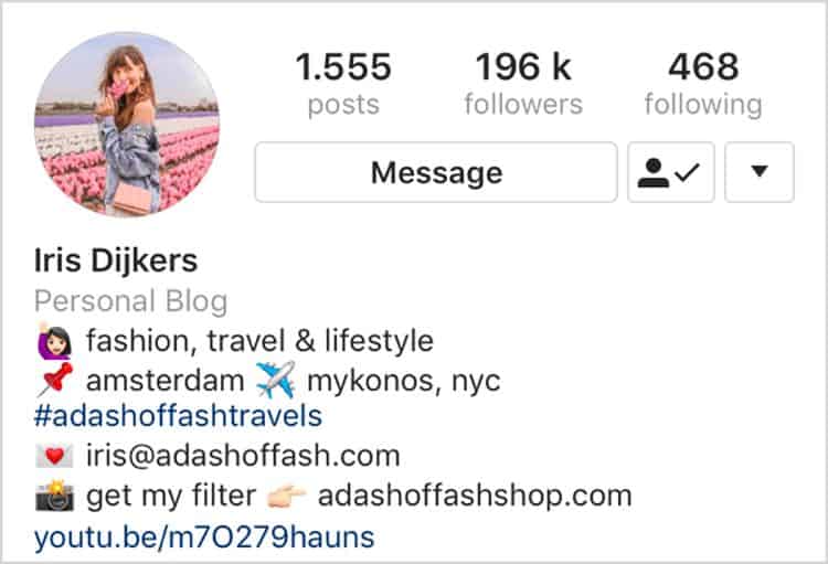 The instagram account of a girl with a flower in her hand.