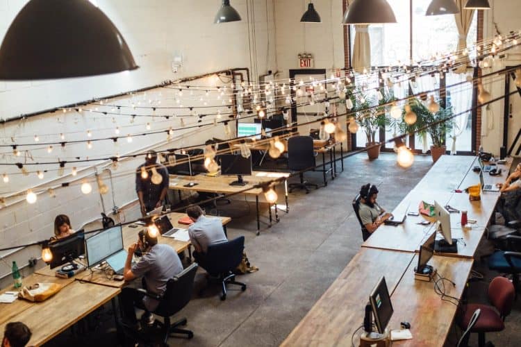 image1 A large open office with people working at desks.