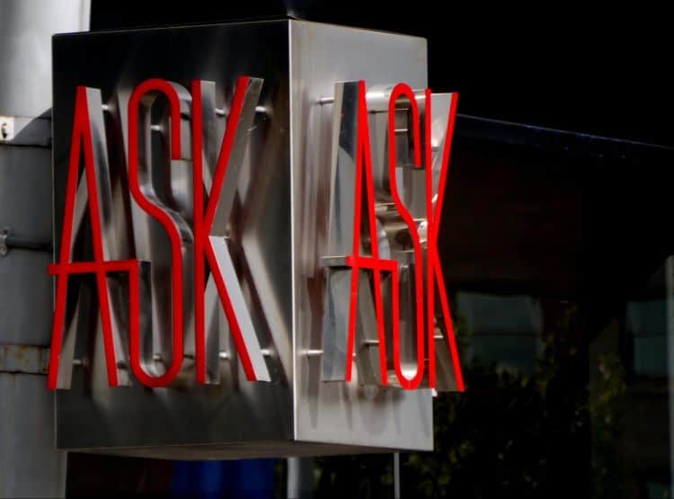 A sign with the word ask on it.
