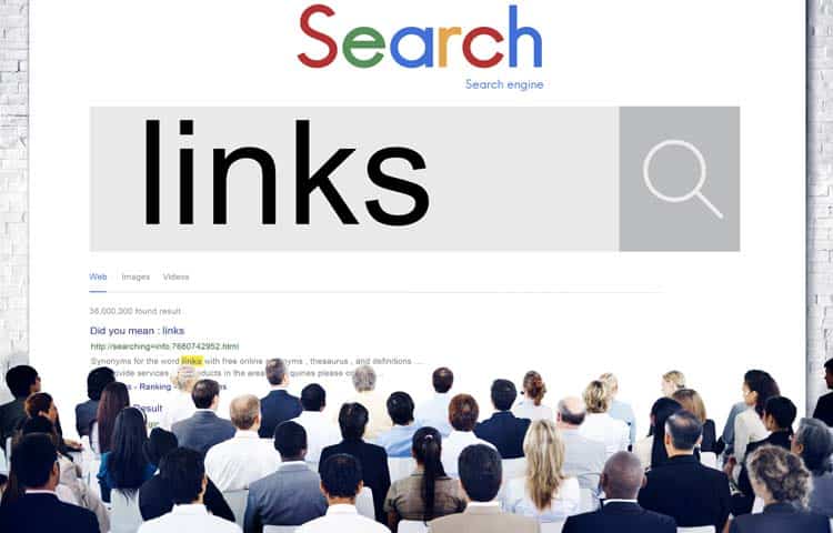 A group of people standing in front of a screen with the word search links.