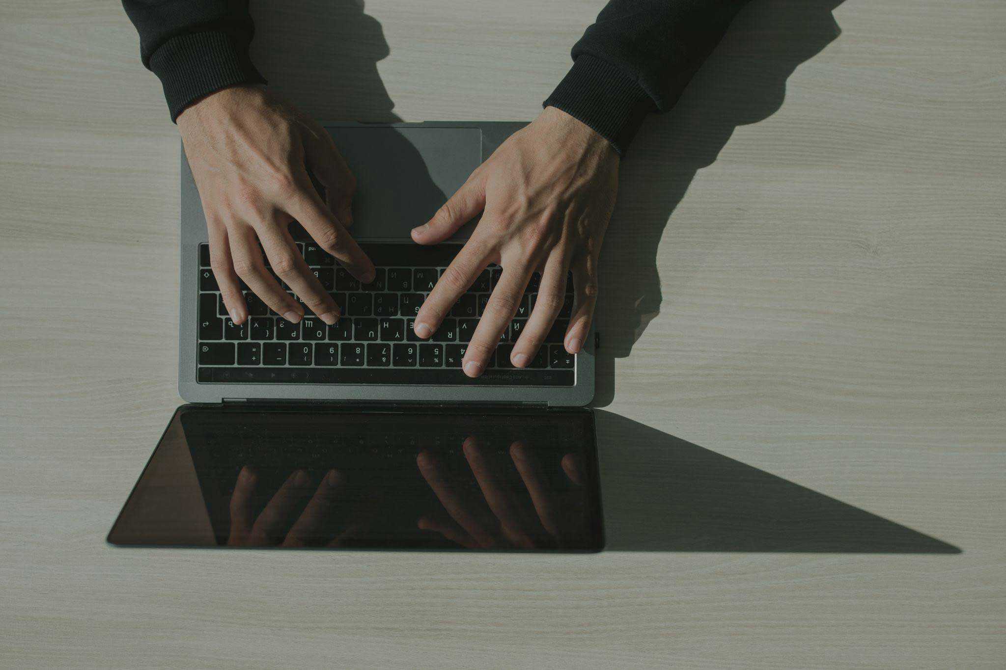 man working on laptop