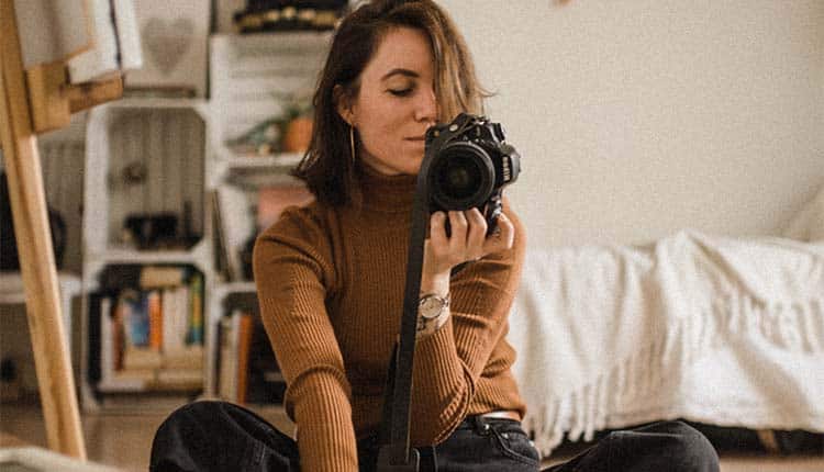 Girl holding camera