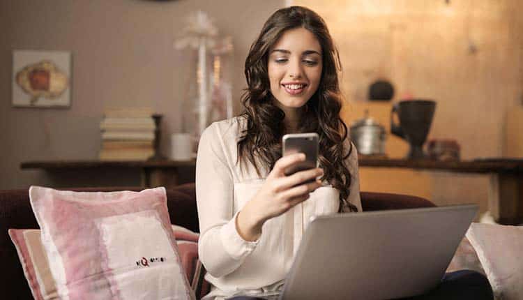 Woman holding a smart phone