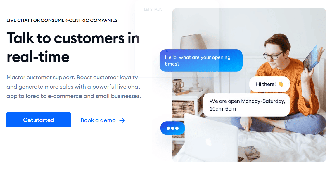 A woman is sitting on a bed and talking to customers in real time.