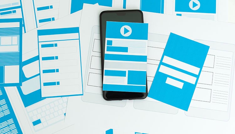 Developing wireframe UX/UI mobile application design for mobile user experience.